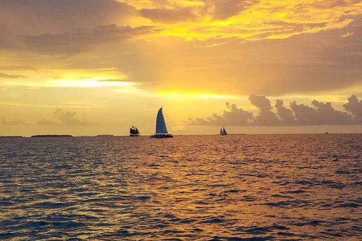 a sunset over a body of water