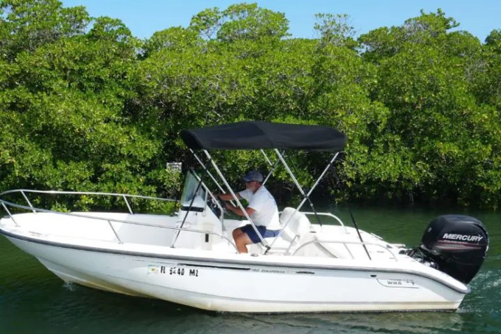 a small boat in a body of water