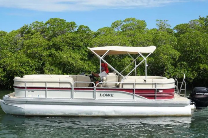 a small boat in a body of water