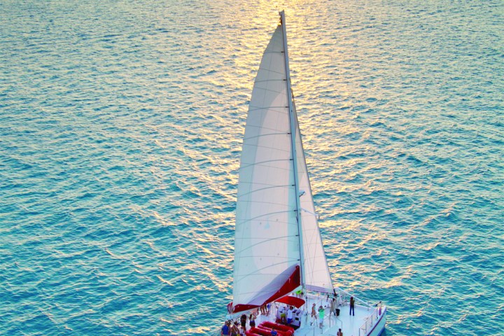 a boat floating on a large body of water