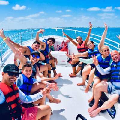a group of people on a raft in a body of water