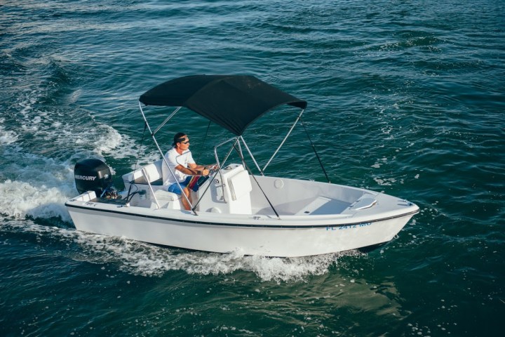 a small boat in a body of water