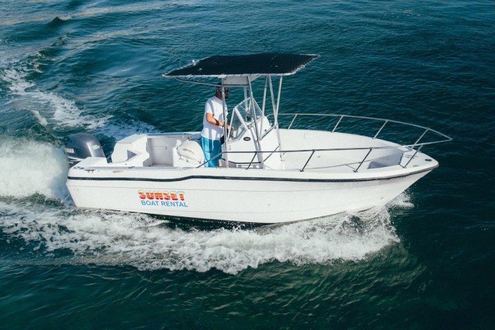 a small boat in a body of water