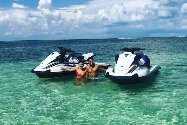 a small boat in a body of water