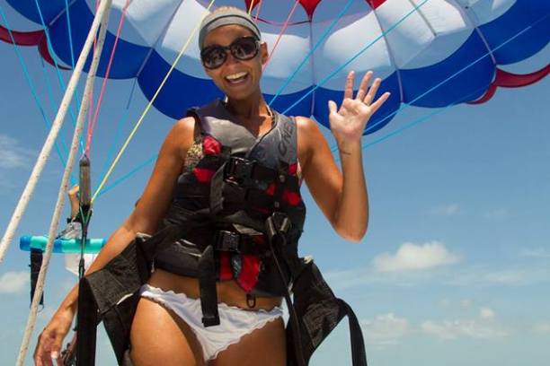 a person holding a parachute